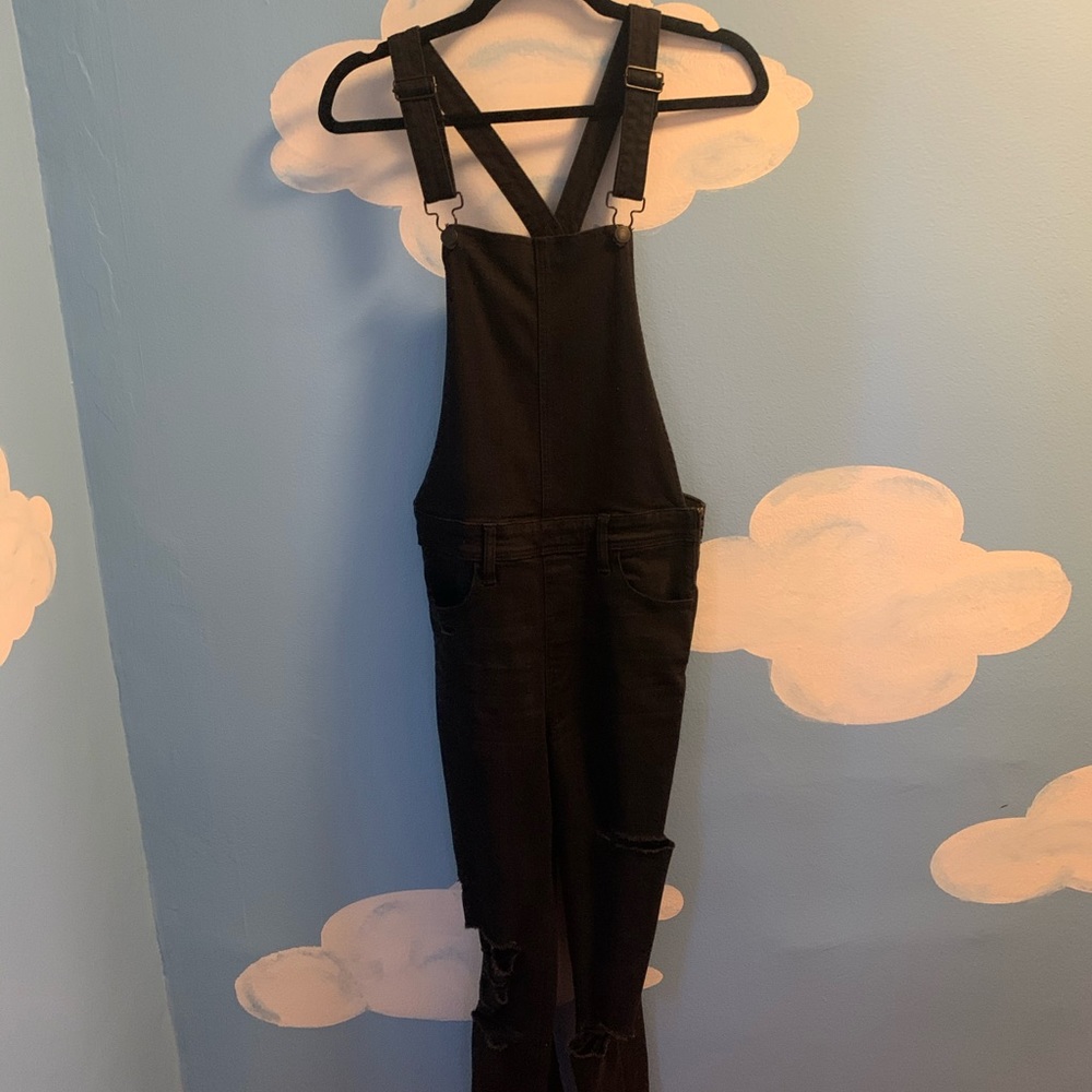 American Eagle black ripped overalls